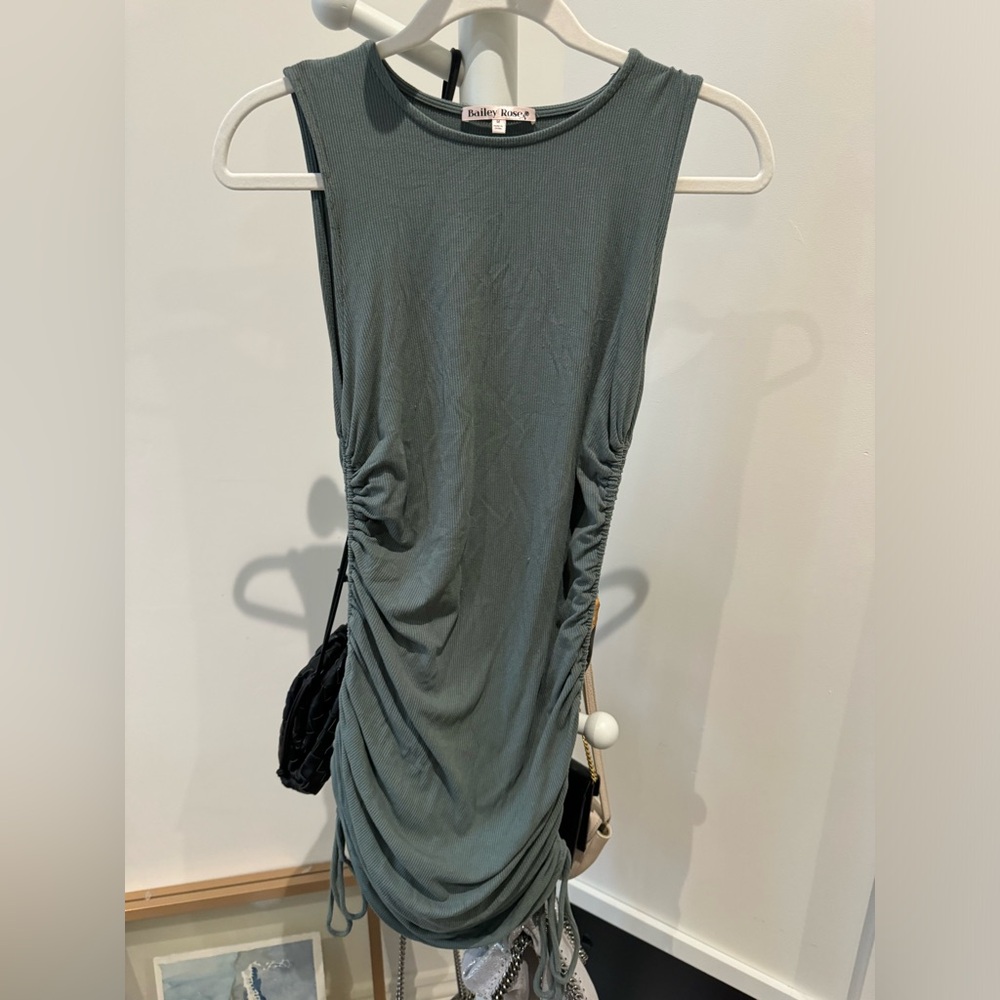 Green ruched mini dress
